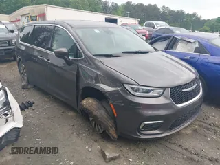 2023 Chrysler Pacifica Hybrid Touring L with VIN 2C4RC1L72PR540902, listed as a IAAI auction lot 42151047 with Not Provided miles and . Bid and sale history available at DreamBid. Image 1.