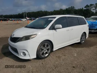 2012 Toyota Sienna SE with VIN 5TDXK3DC3CS238991, listed as a Copart auction lot 63030205 with 83,147 mi miles and Salvage title. Bid and sale history available at DreamBid. Image 1.