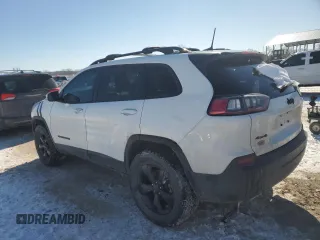 2020 Jeep Cherokee Altitude with VIN 1C4PJMLX9LD511845, listed as a Copart auction lot 46396405 with 122,338 mi miles and Salvage Title. Bid and sale history available at DreamBid. Image 2.