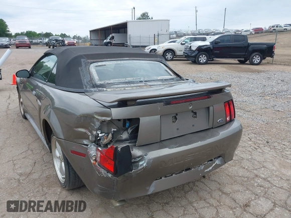 2001 Ford Mustang Deluxe z VIN 1FAFP44411F159656, wystawiony jako IAAI lot #42123128 z przebiegiem 191 814 mil mil oraz . Historia ofert i sprzedaży dostępna na DreamBid. Obrazek 6.