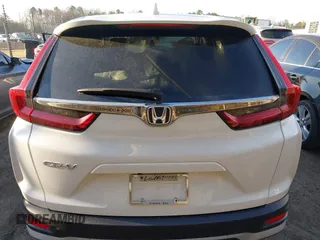 2021 Honda CR-V EX with VIN 2HKRW1H5XMH402791, listed as a IAAI auction lot 41815299 with 58,700 mi miles. Bid and sale history available at carsss.com. Image 17.