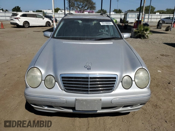 2001 Mercedes-Benz E-Class with VIN WDBJH65J01B276815, listed as a Copart auction lot 75748694 with 208,827 mi miles and Clean Title. Bid and sale history available at carsss.com. Image 5.