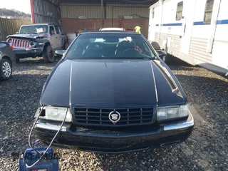 1999 Cadillac Eldorado Touring z VIN 1G6ET129XXU603042, wystawiony jako IAAI lot #41699955 z przebiegiem 81 704 mil mil oraz . Historia ofert i sprzedaży dostępna na DreamBid. Obrazek 13.