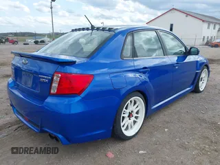 2012 Subaru WRX WRX z VIN JF1GV7E65CG017853, wystawiony jako IAAI lot #41915526 z przebiegiem 93 268 mil mil oraz . Historia ofert i sprzedaży dostępna na DreamBid. Obrazek 4.