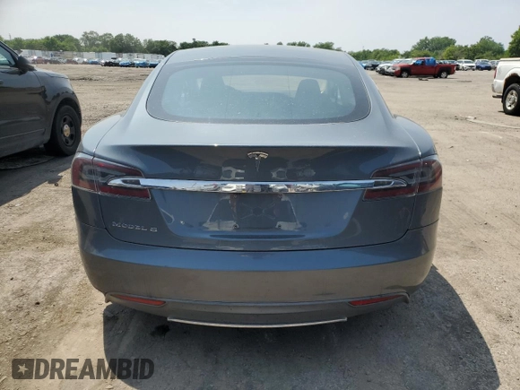 2013 Tesla Model S with VIN 5YJSA1AG9DFP04910, listed as a Copart auction lot 60827335 with 97,022 mi miles and Salvage title. Bid and sale history available at DreamBid. Image 6.