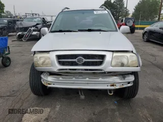 1999 Suzuki Grand Vitara JLX z VIN JS3TD62V9X4123460, wystawiony jako Copart lot #58574925 z przebiegiem 260 368 mil mil oraz Szkoda całkowita • Salvage title. Historia ofert i sprzedaży dostępna na DreamBid. Obrazek 5.