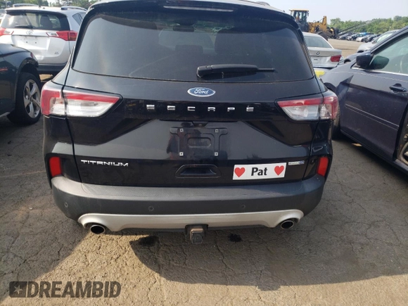 2020 Ford Escape Titanium z VIN 1FMCU9J97LUB25055, wystawiony jako Copart lot #60326945 z przebiegiem 78 711 mil mil oraz Szkoda całkowita • Salvage title. Historia ofert i sprzedaży dostępna na DreamBid. Obrazek 6.