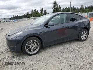 2024 Tesla Model Y Long Range with VIN 7SAYGDEE9RF069801, listed as a Copart auction lot 60857145 with 18,808 mi miles and Salvage title. Bid and sale history available at DreamBid. Image 1.