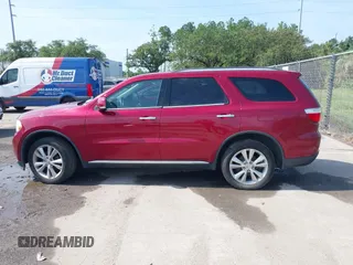 2013 Dodge Durango Crew z VIN 1C4RDJDG6DC672934, wystawiony jako IAAI lot #42542073 z przebiegiem 181 812 mil mil oraz . Historia ofert i sprzedaży dostępna na DreamBid. Obrazek 14.