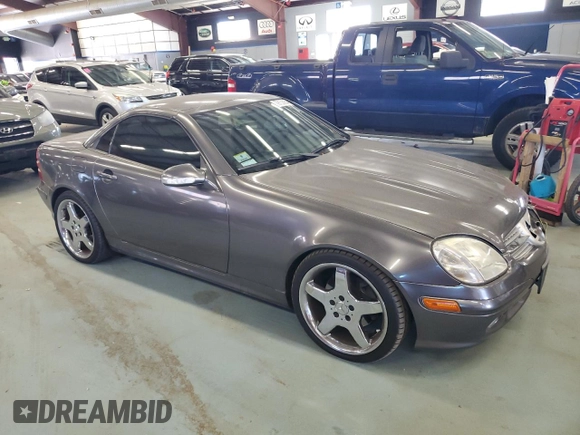 2003 Mercedes-Benz SLK 320 with VIN WDBKK65F83F280656, listed as a Copart auction lot 79158954 with 99,413 mi miles and Salvage title. Bid and sale history available at DreamBid. Image 4.