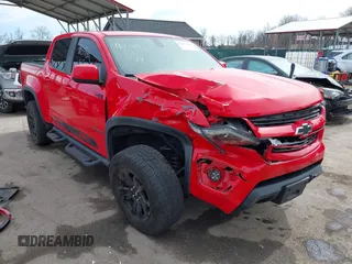 2018 Chevrolet Colorado 4WD Z71 z VIN 1GCGTDEN8J1141945, wystawiony jako IAAI lot #41837680 z przebiegiem 67 686 mil mil oraz . Historia ofert i sprzedaży dostępna na DreamBid. Obrazek 1.