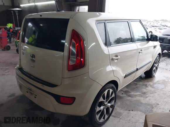 2012 Kia Soul + with VIN KNDJT2A68C7413581, listed as a IAAI auction lot 41433925 with 237,141 mi miles. Bid and sale history available at carsss.com. Image 4.