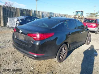 2013 Kia Optima LX with VIN 5XXGM4A71DG185525, listed as a IAAI auction lot 40803086 with 171,741 mi miles. Bid and sale history available at carsss.com. Image 4.