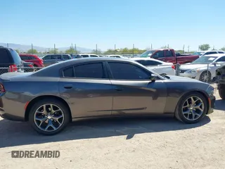 2015 Dodge Charger SXT with VIN 2C3CDXHG4FH890684, listed as a IAAI auction lot 41896958 with 118,140 mi miles and . Bid and sale history available at DreamBid. Image 13.