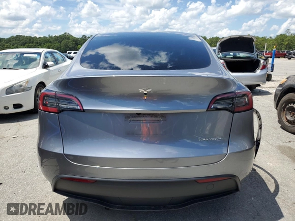 2024 Tesla Model Y Long Range z VIN 7SAYGDEE7RA308338, wystawiony jako Copart lot #61137375 z przebiegiem 19 501 mil mil oraz Szkoda całkowita • Salvage title. Historia ofert i sprzedaży dostępna na DreamBid. Obrazek 6.