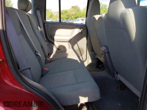 2005 Jeep Liberty Sport with VIN 1J4GL48K95W662399, listed as a IAAI auction lot 41900952 with 127,230 mi miles. Bid and sale history available at carsss.com. Image 8.