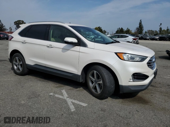 2019 Ford Edge SEL with VIN 2FMPK3J95KBB97431, listed as a Copart auction lot 58790065 with 72,357 mi miles and Salvage title. Bid and sale history available at DreamBid. Image 4.