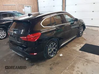 2020 BMW X1 xDrive28i z VIN WBXJG9C07L5P71792, wystawiony jako IAAI lot #41583132 z przebiegiem 150 095 mil mil oraz . Historia ofert i sprzedaży dostępna na DreamBid. Obrazek 4.
