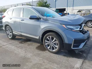 2020 Honda CR-V Hybrid Touring with VIN 7FART6H91LE007568, listed as a IAAI auction lot 41557295 with 34,797 mi miles. Bid and sale history available at carsss.com. Image 1.