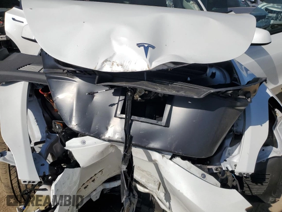 2024 Tesla Model Y Long Range with VIN 7SAYGDEE0RF081948, listed as a Copart auction lot 52612805 with 12,099 mi miles and Salvage Title. Bid and sale history available at DreamBid. Image 11.