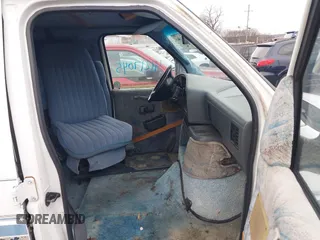 1996 Ford Econoline Cargo with VIN 1FDEE14N7THA03059, listed as a IAAI auction lot 41217045 with 139,435 mi miles and . Bid and sale history available at DreamBid. Image 5.