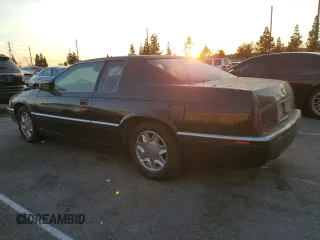 1999 Cadillac Eldorado ESC with VIN 1G6EL12Y8XU614645, listed as a Copart auction lot 86353754 with 151,243 mi miles and Clean Title. Bid and sale history available at DreamBid. Image 2.