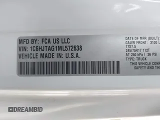 2021 Jeep Gladiator Willys with VIN 1C6HJTAG1ML572638, listed as a IAAI auction lot 42065562 with 43,040 mi miles and . Bid and sale history available at DreamBid. Image 9.