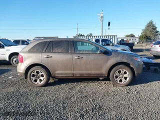 2013 Ford Edge SEL with VIN 2FMDK4JC5DBA97837, listed as a IAAI auction lot 41549296 with 128,943 mi miles. Bid and sale history available at carsss.com. Image 14.