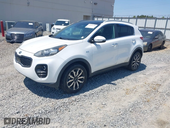 2017 Kia Sportage EX with VIN KNDPNCACXH7079500, listed as a IAAI auction lot 42051156 with 100,928 mi miles and . Bid and sale history available at DreamBid. Image 2.