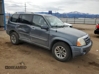 2006 Suzuki XL7 with VIN JS3TX92V764106356, listed as a Copart auction lot 50457515 with 153,813 mi miles and Salvage title. Bid and sale history available at DreamBid. Image 4.
