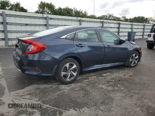 2021 Honda Civic LX z VIN 2HGFC2F69MH502002, wystawiony jako Copart lot #52882605 z przebiegiem Nie podano mil oraz Szkoda całkowita • Salvage title. Historia ofert i sprzedaży dostępna na DreamBid. Obrazek 3.