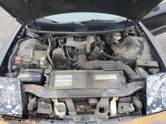 1995 Pontiac Firebird Firebird z VIN 2G2FS22S7S2241784, wystawiony jako Copart lot #53587895 z przebiegiem 218 211 mil mil oraz Czysty tytuł • Clean title. Historia ofert i sprzedaży dostępna na DreamBid. Obrazek 11.