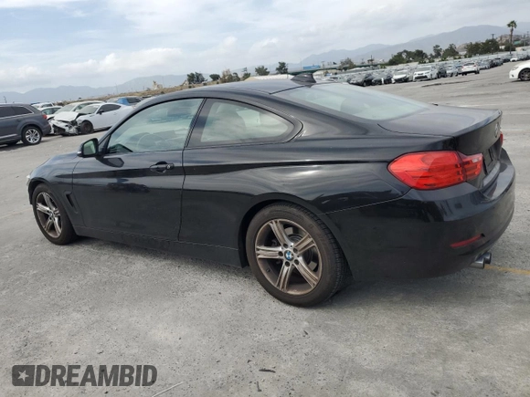 2014 BMW 4 Series 428i with VIN WBA3N7C55EF719986, listed as a Copart auction lot 56692685 with 74,377 mi miles and Salvage title. Bid and sale history available at DreamBid. Image 2.