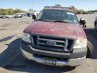 2005 Ford F-150 XL with VIN 1FTRF12W65KC58208, listed as a Copart auction lot 82281114 with 129,774 mi miles and Salvage title. Bid and sale history available at DreamBid. Image 5.