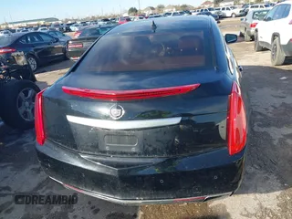 2013 Cadillac XTS Luxury with VIN 2G61P5S34D9237884, listed as a IAAI auction lot 41336761 with 156,830 mi miles and . Bid and sale history available at DreamBid. Image 16.