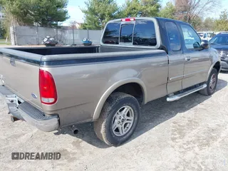 2003 Ford F-150 XL with VIN 1FTRX18L53NB01663, listed as a IAAI auction lot 41887655 with 177,914 mi miles. Bid and sale history available at carsss.com. Image 4.