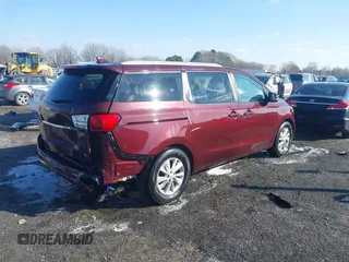 2015 Kia Sedona LX with VIN KNDMB5C14F6059569, listed as a IAAI auction lot 41564739 with 167,275 mi miles. Bid and sale history available at carsss.com. Image 4.