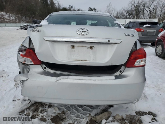 2011 Toyota Yaris with VIN JTDBT4K37B1401590, listed as a Copart auction lot 46142555 with 165,082 mi miles and Salvage Title. Bid and sale history available at carsss.com. Image 6.