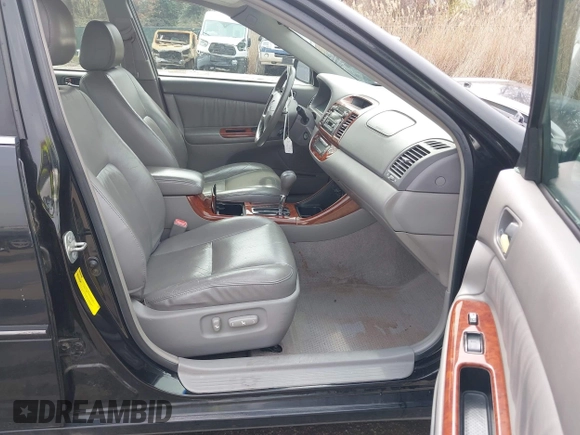 2004 Toyota Camry LE with VIN 4T1BF30K34U080477, listed as a IAAI auction lot 41956998 with 135,441 mi miles. Bid and sale history available at carsss.com. Image 5.