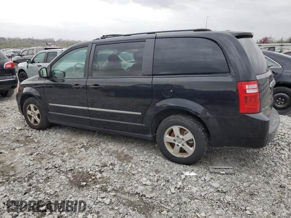 2010 Dodge Grand Caravan SXT with VIN 2D4RN5DX4AR124702, listed as a Copart auction lot 51654365 with 231,910 mi miles and Salvage Title. Bid and sale history available at DreamBid. Image 2.