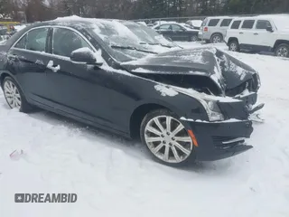 2016 Cadillac ATS Sedan Luxury Collection AWD with VIN 1G6AH5RXXG0106897, listed as a IAAI auction lot 41497851 with 135,285 mi miles. Bid and sale history available at carsss.com. Image 1.