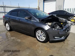 2015 Ford Focus Titanium с VIN 1FADP3J2XFL200668, выставлен на аукционе Copart как лот 54010865 с пробегом 138 459 миль миль и Списание • Salvage title. История ставок и продаж доступна на DreamBid. Изображение 4.