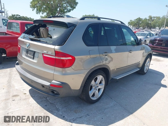 2008 BMW X5 3.0si with VIN 5UXFE43568L024029, listed as a IAAI auction lot 42107247 with 135,607 mi miles. Bid and sale history available at carsss.com. Image 4.