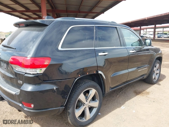 2014 Jeep Grand Cherokee Overland with VIN 1C4RJFCG4EC273786, listed as a IAAI auction lot 41901304 with 73,055 mi miles. Bid and sale history available at carsss.com. Image 6.
