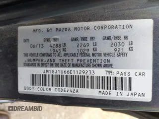 2014 Mazda 6 i Sport with VIN JM1GJ1U66E1129233, listed as a IAAI auction lot 42045330 with 195,071 mi miles and . Bid and sale history available at carsss.com. Image 9.