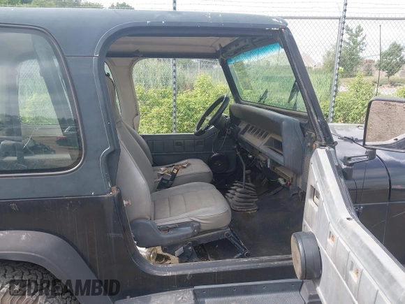 1994 Jeep Wrangler S with VIN 1J4FY19P1RP451154, listed as a IAAI auction lot 42629559 with 149,170 mi miles and . Bid and sale history available at DreamBid. Image 5.