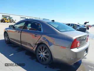 2012 Chevrolet Malibu 1LS with VIN 1G1ZB5E02CF193172, listed as a IAAI auction lot 41758574 with 196,290 mi miles and . Bid and sale history available at DreamBid. Image 6.