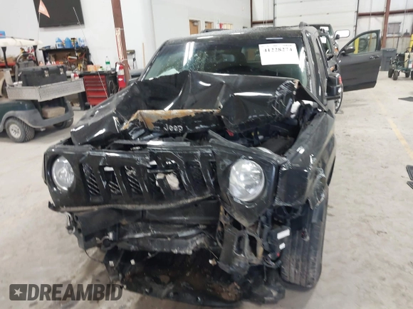 2014 Jeep Patriot Latitude with VIN 1C4NJPFA9ED887903, listed as a IAAI auction lot 41228274 with 82,225 mi miles and . Bid and sale history available at carsss.com. Image 12.