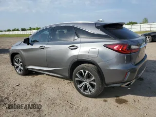 2019 Lexus RX 350 z VIN 2T2ZZMCA9KC129707, wystawiony jako Copart lot #52202615 z przebiegiem 69 868 mil mil oraz Szkoda całkowita • Salvage title. Historia ofert i sprzedaży dostępna na DreamBid. Obrazek 2.