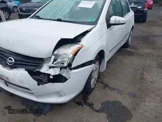 2012 Nissan Sentra S z VIN 3N1AB6APXCL636612, wystawiony jako IAAI lot #42610932 z przebiegiem 150 605 mil mil oraz . Historia ofert i sprzedaży dostępna na DreamBid. Obrazek 6.
